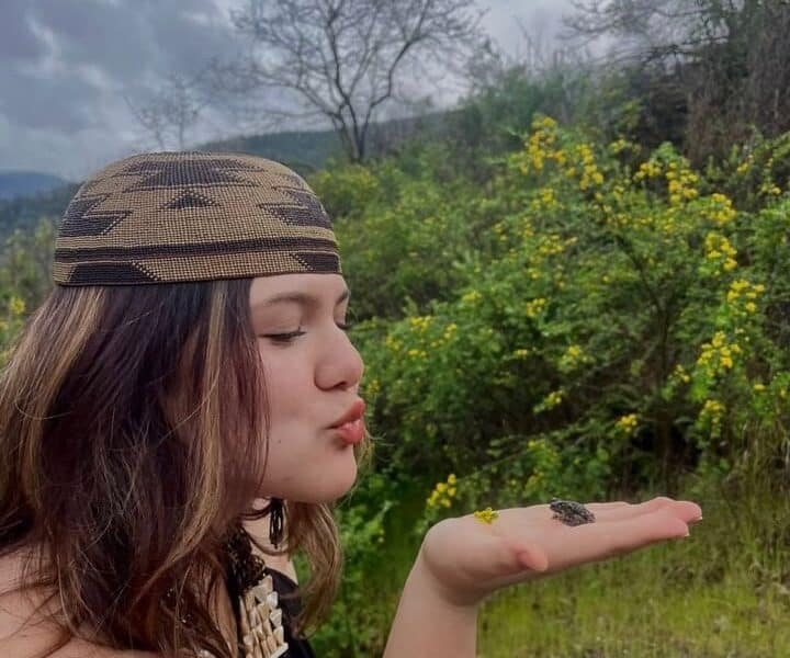 Kinehstan Lewis, Hooopa, pictured in cap and beads